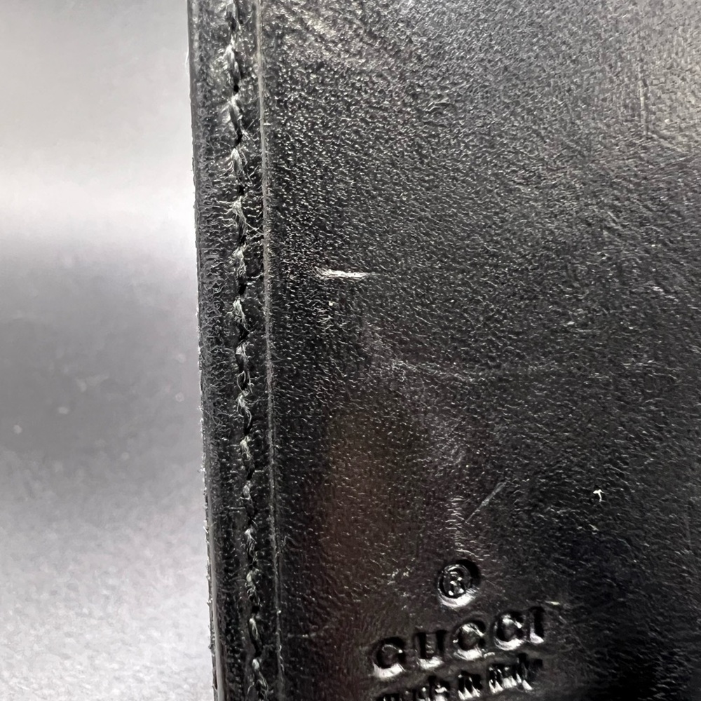 Gucci Black GG Canvas
Piston Lock Compact Wallet. - Picture 6 of 8